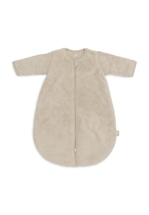 Longue gigoteuse beige pour bébé avec manches longues et fermeture éclair à l'avant, en tissu doux et texturé.