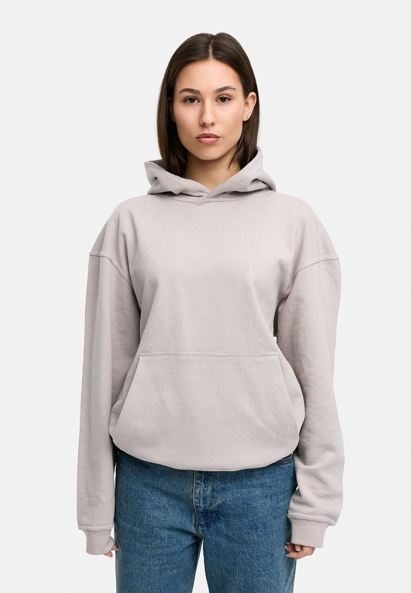Light grey hoodie with a front pocket, spacious hood, and relaxed fit. The soft material has a smooth texture and ribbed cuffs.