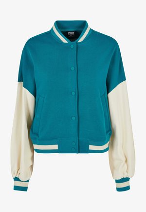 Teal og krem zip-up bomberjakke med krave, trykknapper, to sidelommer og stripete detaljer på mansjetter og kant. Myk tekstur.