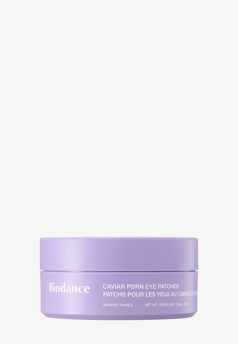 Ronde lavendelkleurige container met het label "Biodance Caviar PDRN Eye Patches", bevat 30 paar, netto gewicht 85 g (2,99 oz).
