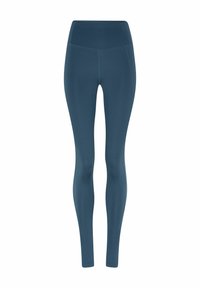Hoogwaardige, lange damesleggings in donkerblauw met een gladde, elastische stof en platte naden, geschikt voor sportkleding.