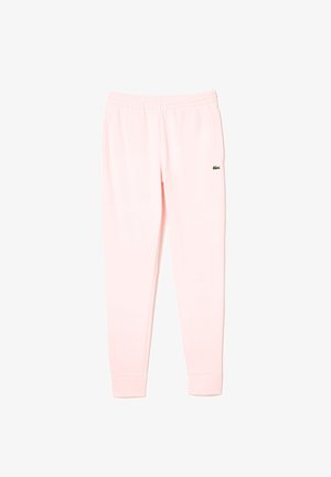 Lichtroze joggerbroek met elastische tailleband en geribde boorden, met een klein groen krokodillenlogo op de rechterdij.