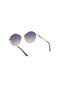 Occhiali da sole in metallo color oro con montatura esagonale, lenti viola sfumate, naselli regolabili e punte delle tempie blu navy.