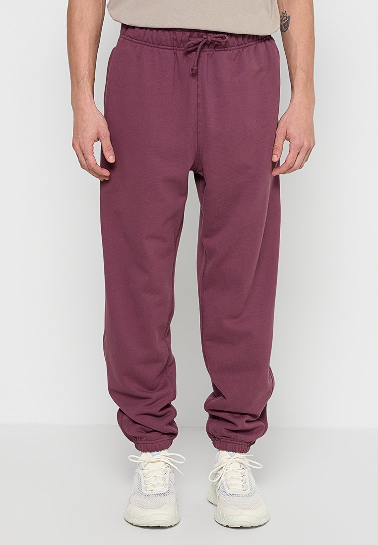 New Balance Trainingsbroek paars New Balance Trainingsbroek paars