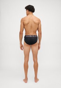 Calvin Klein Underwear HIP BRIEF INTENSE POWER 3 PACK  - Briefs - black/syrah/sand/brown