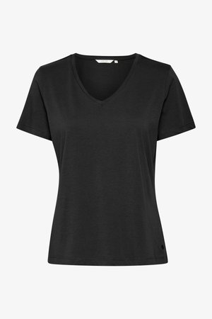 Melnā v-veida krekls ar īsām piedurknēm, izgatavots no mīkstas auduma. Piedāvā brīvu piegriezumu un smalku logotipu detaļu tuvu apakšmalai.