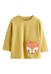 Maglietta a maniche lunghe gialla con pois bianchi e tasca a forma di volto di volpe. Tessuto morbido con scollo arrotondato e vestibilità comoda.
