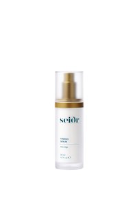 Klar glassflaske med en gullpumpe-topp, merket "FIRMING SERUM" i teal, som inneholder 30 ml anti-aging serum. Jevn, moderne design.