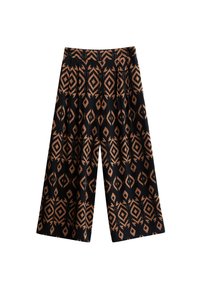 Wide-leg black pants with brown geometric diamond patterns and pleats at the waistband, displayed on a white background.