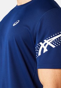 ASICS ICON SS TOP - Sports T-shirt - blue expanse birch