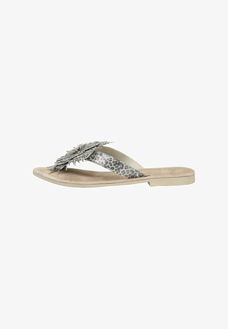 Sandale plate beige avec des brides imprimé animal et une grande décoration florale superposée sur la partie supérieure des orteils.