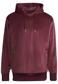 Tummanpunainen huppari pehmeästä samettimateriaalista. Siinä on tasku, jossa on vetoketjut, sekä resorit hihansuissa ja helmassa. Koristeltu kullanvärisillä metalliosilla.