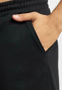 Rocawear CLEAN - Teplákové kalhoty - black