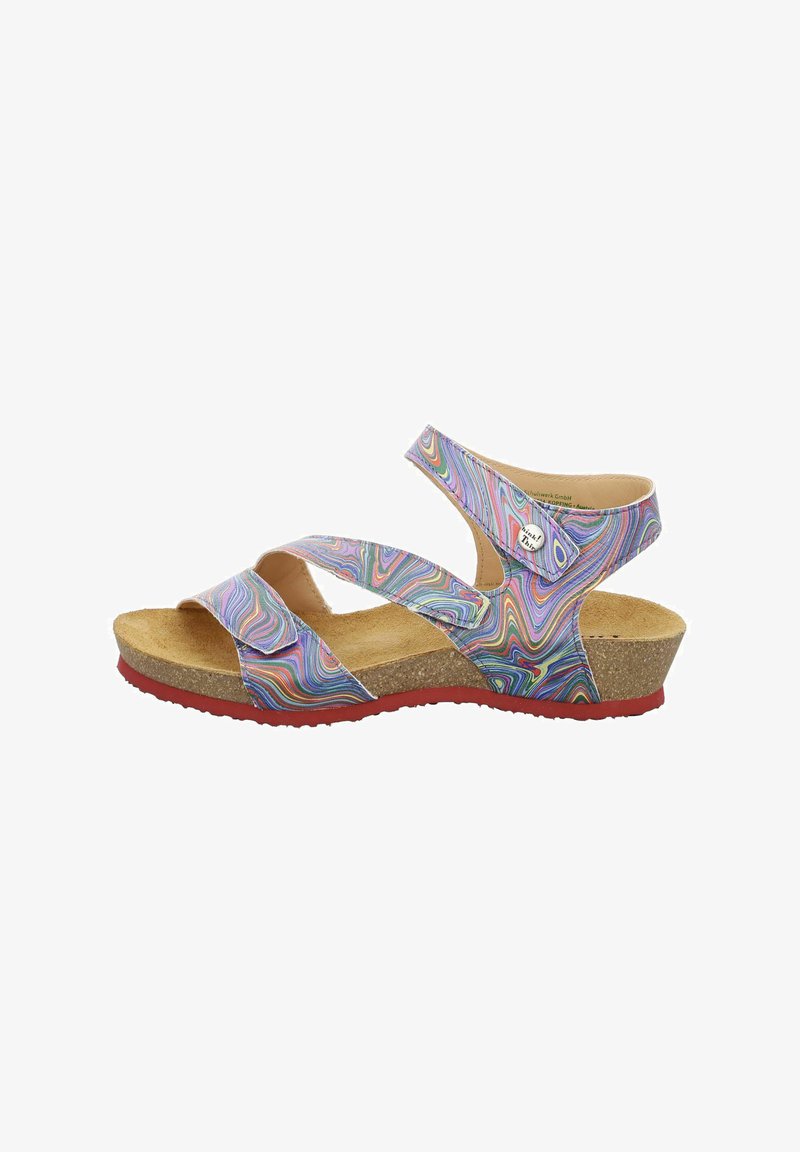 Multicolored sandal with cross straps, cork footbed, and red rubber sole. Features a swirling, pattern on synthetic upper material.