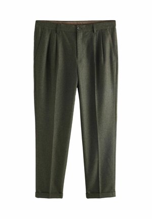 Dunkelgrüne Wollhosen mit tailliertem Schnitt, featuring Falten, Fronttaschen und aufgerolltem Saum. Glatte Textur mit einem subtilen Webmuster.