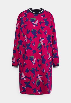 Long-sleeve dress in pink fabric featuring a floral pattern with butterflies in blue, green, and pink; ribbed black and white neckline.