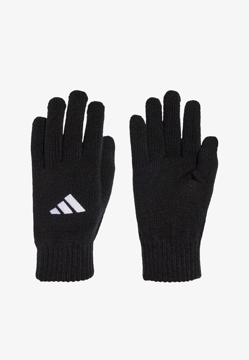Gants en tricot noirs avec poignets côtelés, l'un affichant un logo adidas blanc à trois bandes sur le dos de la main tourné vers le haut.