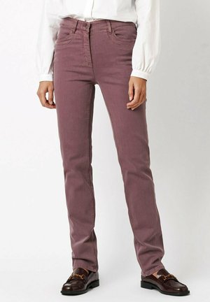Purple cotton blend jeans with a slim fit, five-pocket design, and subtle stitching details, paired with dark loafers and a white blouse.