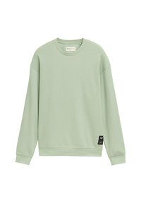 Sudadera verde clara hecha de un tejido texturizado, con cuello redondo, mangas largas y una pequeña etiqueta negra en la parte inferior izquierda.