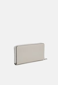 Calvin Klein Jeans SCULPTED ZIP AROUND MONO - Portafoglio - eggshell