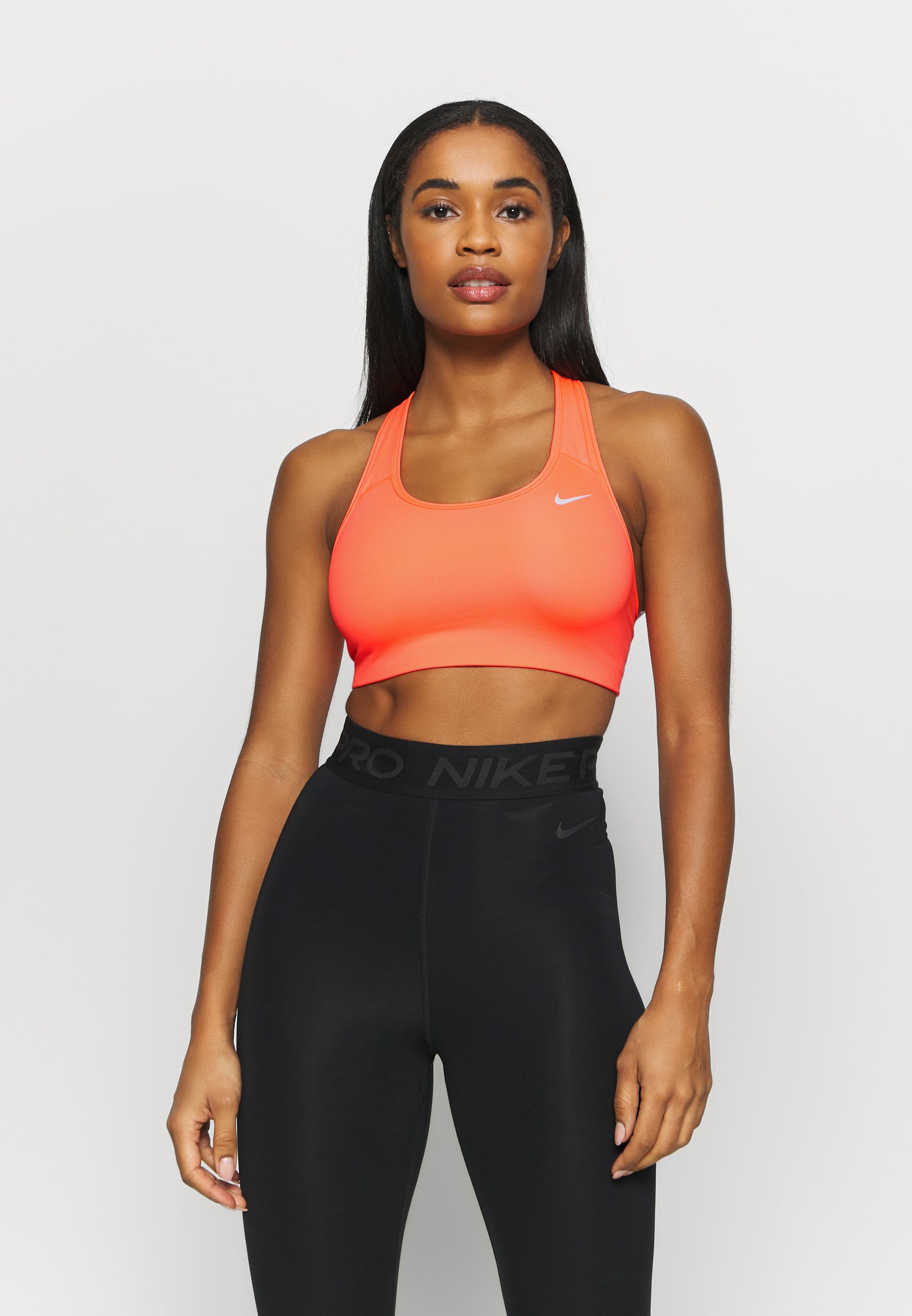 bright orange sports bra