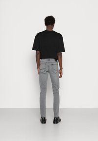 Lee MALONE - Calças de ganga de corte skinny - washed westport