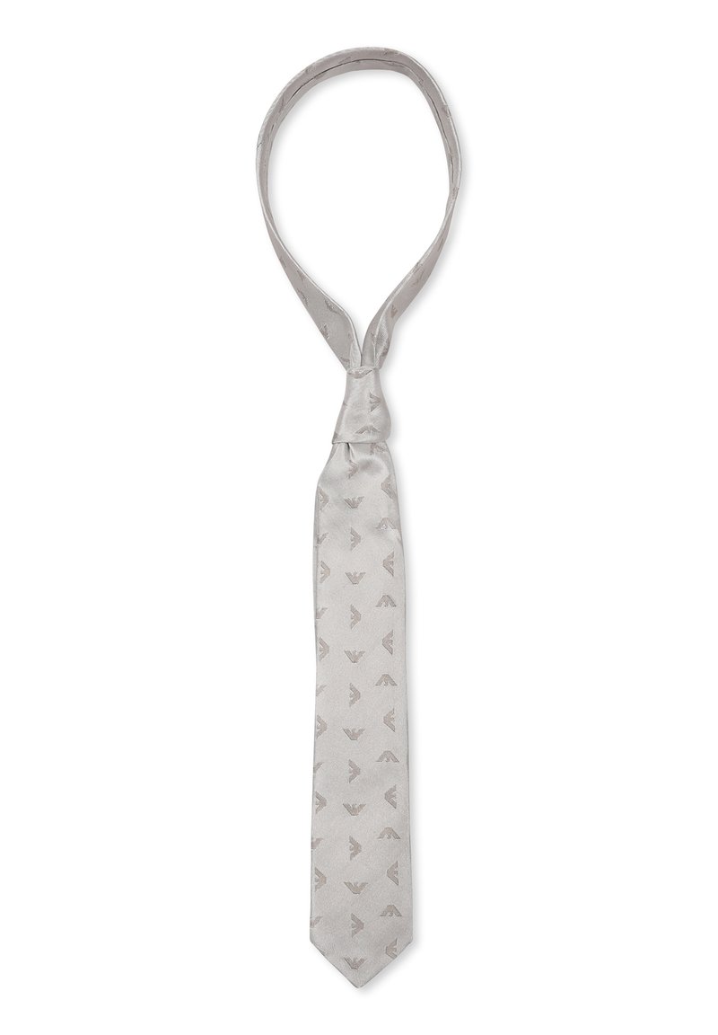 Cravatta in seta grigio chiaro con un sottile motivo geometrico su tutta la superficie. Texture liscia con un'estremità appuntita. Ideale per occasioni formali.
