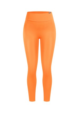 Oranje leggings met een gladde, rekbare stof, hoog tailleontwerp en een naadloze afwerking. Geen zichtbare patronen of hardware details.