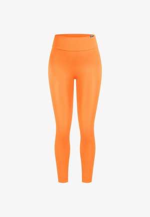 Oranje leggings met een gladde, rekbare stof, hoog tailleontwerp en een naadloze afwerking. Geen zichtbare patronen of hardware details.