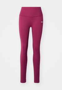 Lilla ribbestrikkede tights med høy livhøyde og en liten hvit logo. Stoffet virker elastisk og glatt, egnet for treningstøy.
