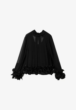 Blusa negra de manga larga con tela transparente, puños con volantes y dobladillo con volantes, con un pequeño detalle de abertura en la zona del escote.