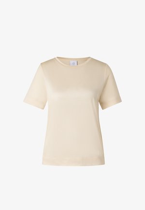 Roomkleurig T-shirt met korte mouwen en ronde hals, gemaakt van een eenvoudig, gladde stof en voorzien van een klein merklabel aan de binnenkant van de halslijn.