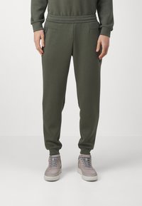 EA7 Emporio Armani - TROUSER - Tracksuit bottoms - verde scuro Thumbnail Image 1