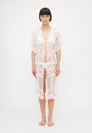 White lace kimono-style cover-up with floral patterns, sheer fabric, short sleeves, and an open front, knee-length design.