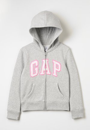 Sweat à capuche zippé gris en tissu mélange de coton. Présente un logo "GAP" rose, des poches avant et une capuche à cordon. Poignets côtelés.