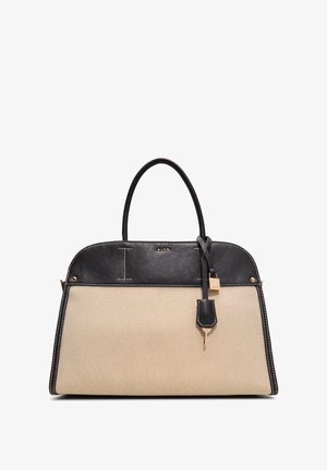 Beige kanvas handväska med svarta läderdetaljer, rundad topp, dubbla handtag och guldfärgad beslag. Kontrastsydd accentuerar designen.