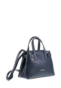 Navy leren handtas met korte hengsels en een afneembare schouderriem, featuring gouden logo-detail, slank ontwerp en een gestructureerde vorm.