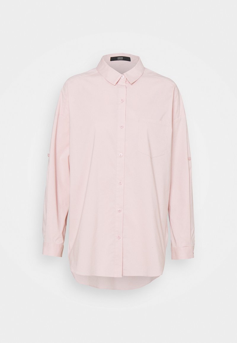 Light pink long-sleeve button-up shirt with collar and chest pocket, displayed against a plain white background.