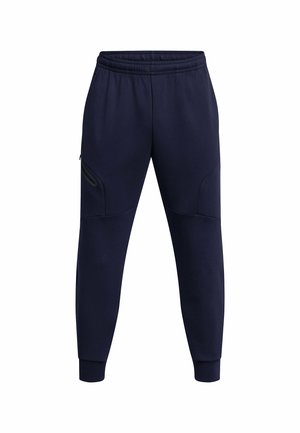 Marina blå sweatpants gjorda av bomullsblandning; har elastisk midja, sidofickor med dragkedjor och åtsittande mudd vid anklarna.