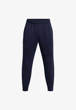 Pantalones de chándal azul marino hechos de una mezcla de algodón; cuentan con una cintura elástica, bolsillos laterales con cremalleras y puños ajustados en los tobillos.