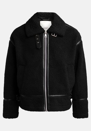 Black fleece jacket with a zip closure, wide collar, and leather accents at the waist and cuffs. Features a textured finish.