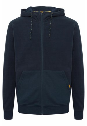 Marineblauwe ritssluiting hoodie van zachte fleece, met een capuchon met trekkoorden, voorkeurszakken en een logo-label aan de onderzijde.