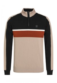 Pull-over à col haut. Présente des blocs de couleurs noir, beige et rouille, une fermeture éclair sur le devant, des poignets côtelés et une texture tissée.