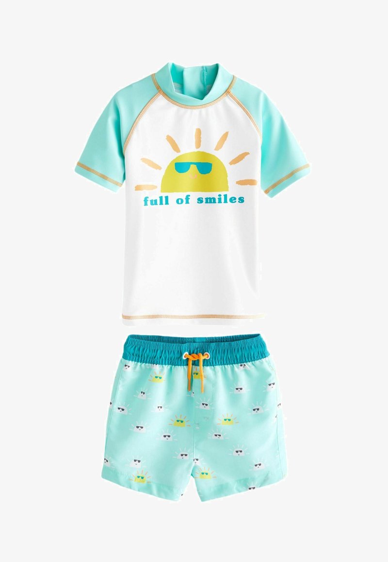 Next SUNSAFE SET - REGULAR FIT - Pantaloni de trening - green white smiles