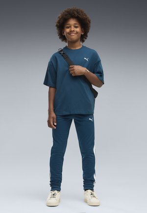 Puma, T7 ALWAYS ON TRACK PANTS B UNISEX - Pantalon de survêtement - midnight petrol