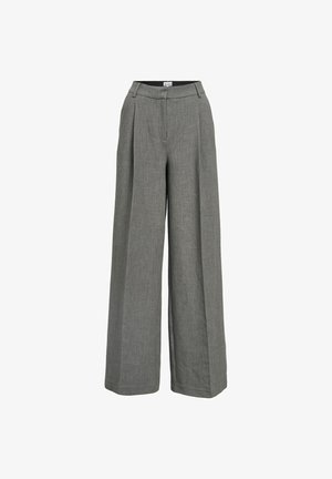 Pilkos plačios kojų kelnės pagamintos iš lengvos audinio. Yra raukšlėta priekinė dalis, aukštas liemuo ir glotnus paviršius.