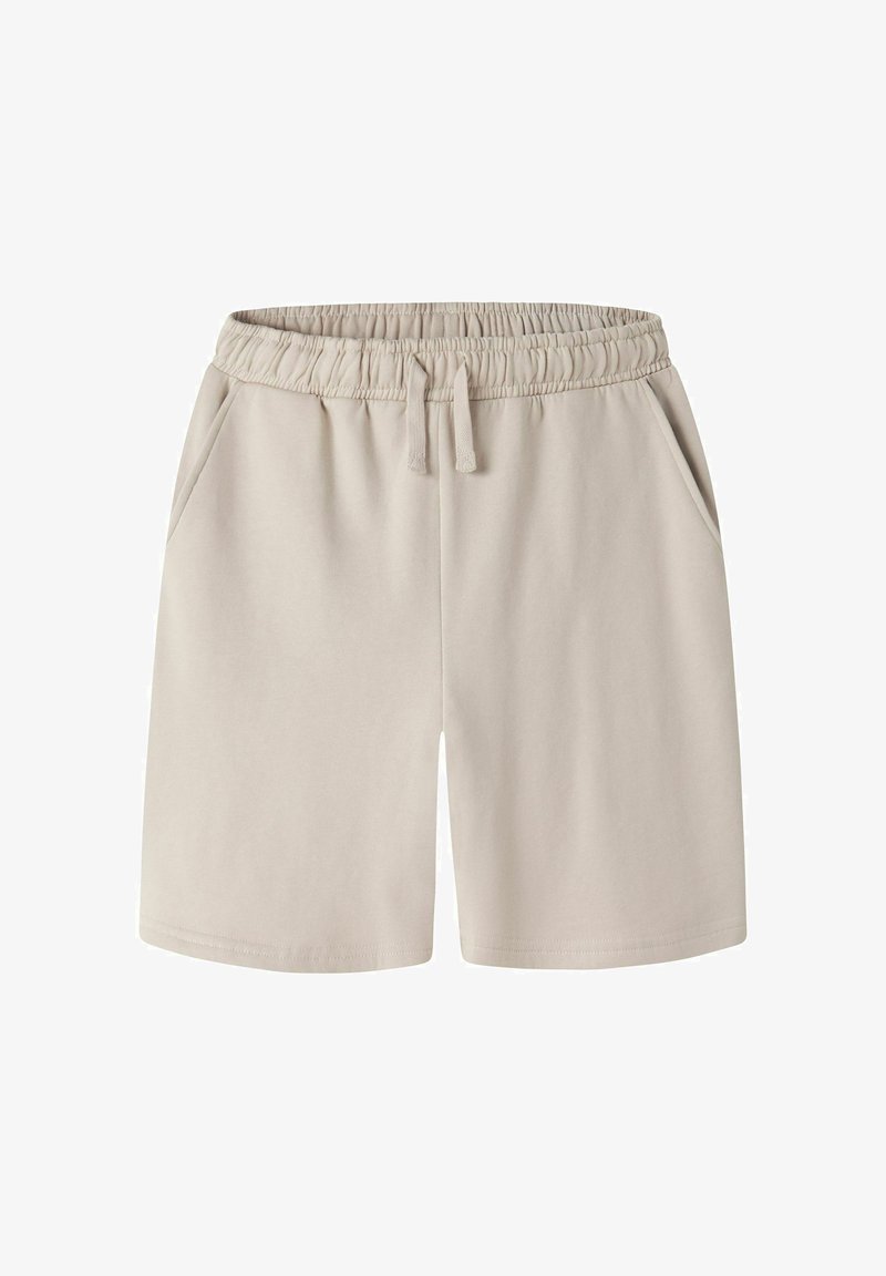 Shorts beige à taille élastique avec cordon de serrage et poches latérales, longueur genoux, en tissu doux pour un port décontracté.