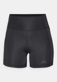 Černé sportovní šortky s vysokým pasem, hladkým materiálem a prošitými švy. Mají decentní logo a boční pruhy jako detail.