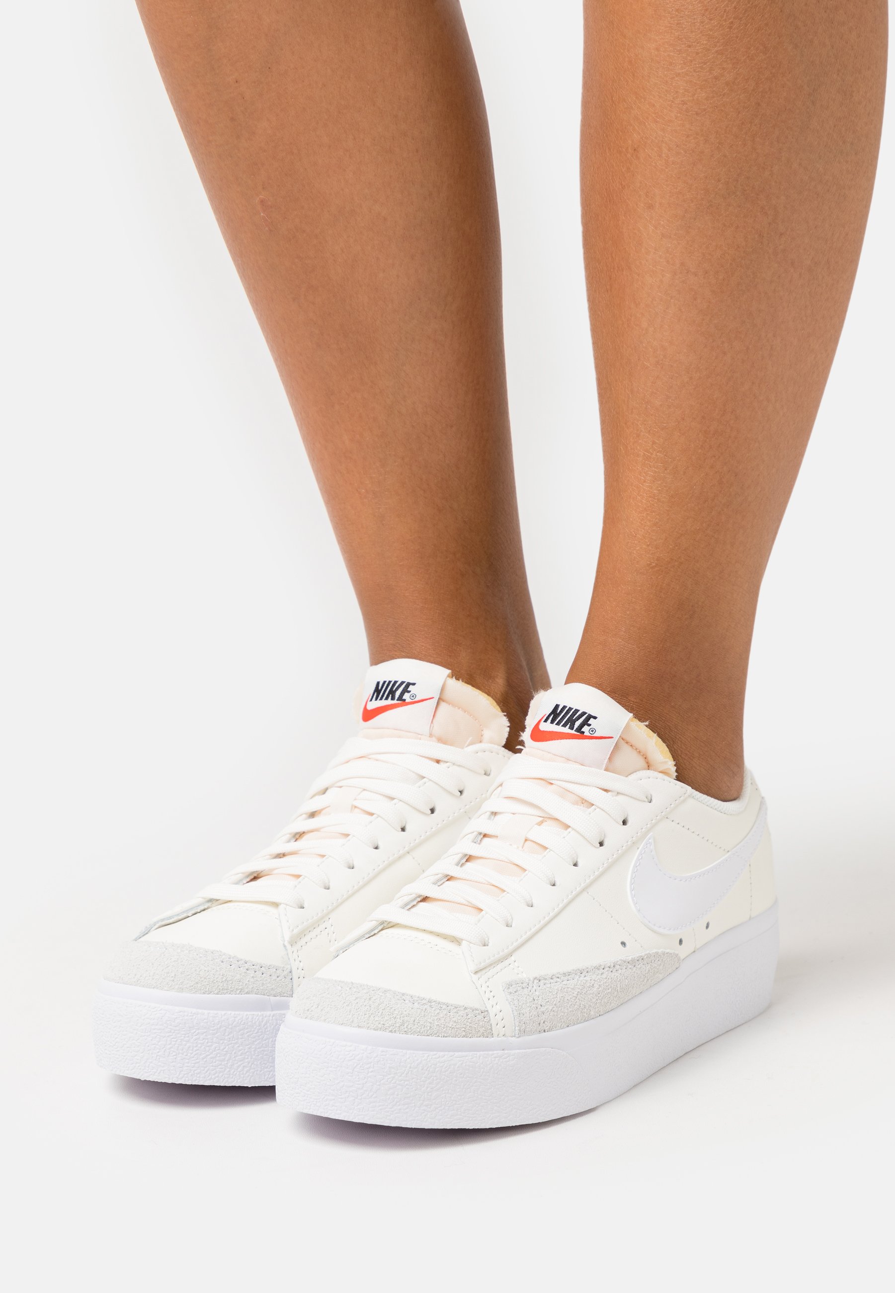 nike women's blazer low platform white black sail team orange