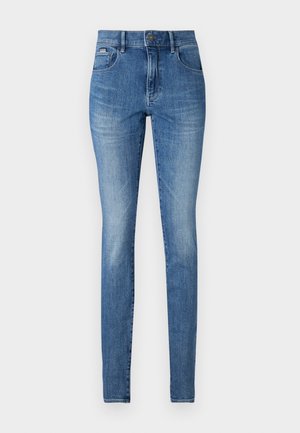 Schmale Jeans aus mittleren blauen Denim, mit hoher Taille, fünf Taschen und subtilen Verwaschungen. Klassischer Knopfverschluss und Gürtelschlaufen.